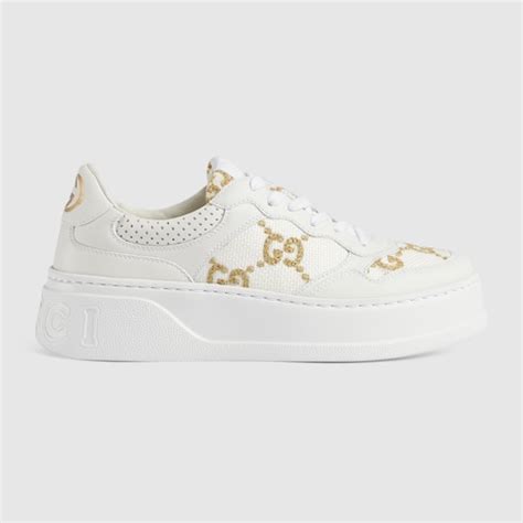 scarpe nere e oro gucci giselle|Sneaker donna GG in pelle bianca .